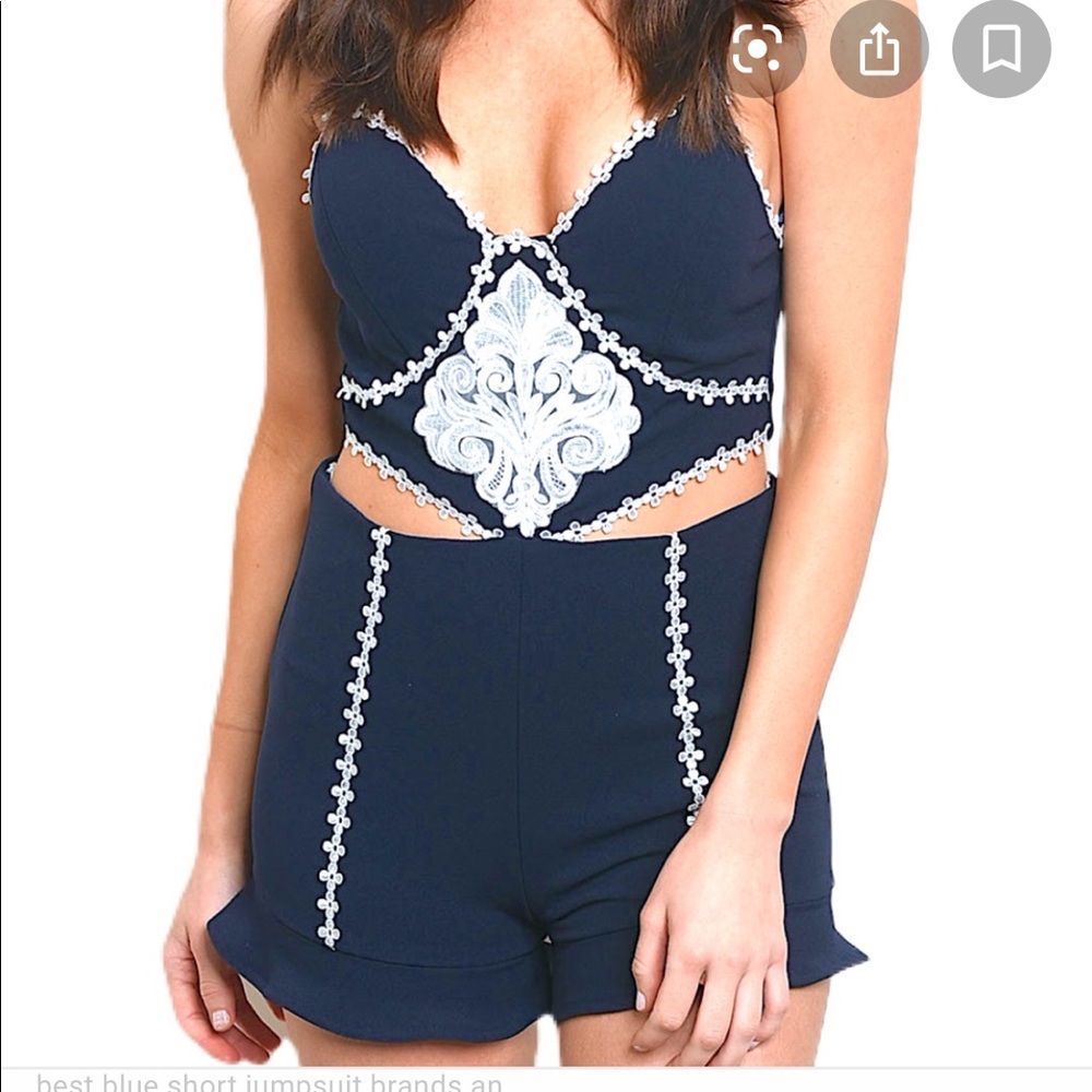 NWT The Sang Navy Floral Cut Out Romper